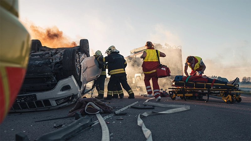 Paramedics and Firefighters Arrive On the Car Crash Traffic Accident